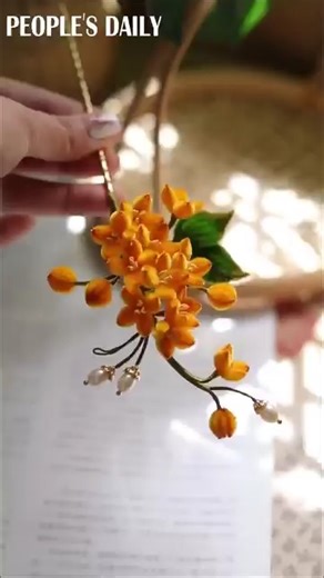 Watch the osmanthus flowers — one of the top ten famous traditional flowers in China — materialize into a delicate and elegant #velvet flower hairpin in the hands of an artist from northwest China's Shaanxi. #ChinaGotTalent | People's Daily, China