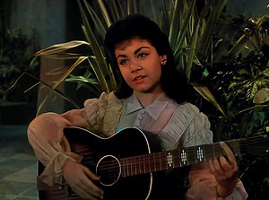 Annette Funicello - Lonely Guitar (1959) In the vibrant tapestry of 1950s pop culture, Annette Funicello's voice stood out distinctly. Transitioning from a Mouseketeer to a recording artist, Annette captivated audiences with hits like "Lonely Guitar," a cherished gem echoing the simplicity and charm of a bygone era. Released in 1959, "Lonely Guitar" marked Annette's shift from television to music. Amid the surf rock craze, it offered a more introspective melody. The song's arrangement blends aco