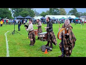 Clann An Drumma Scottish Tribal Pipes and Drums playing in rain for opening 2026 Luss Highland Games