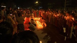 Hundreds gather for candlie-lit Yangon night rally