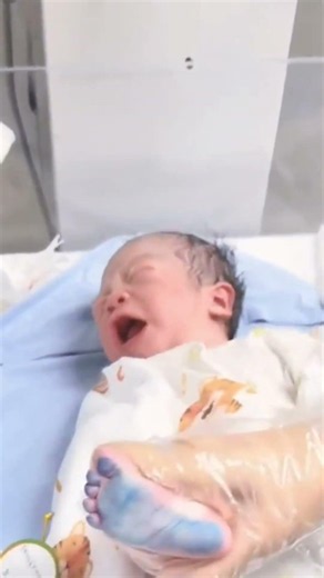 This newborn is making its own crying for the first time