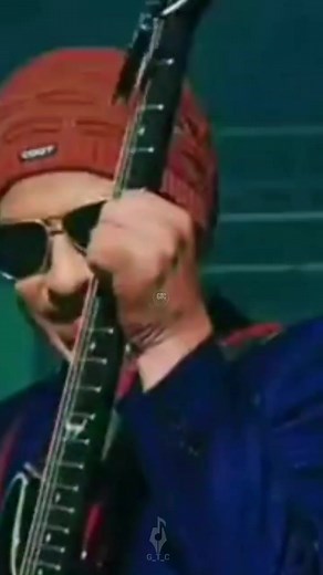 Musical Performance Highlights in Dimly Lit Concert