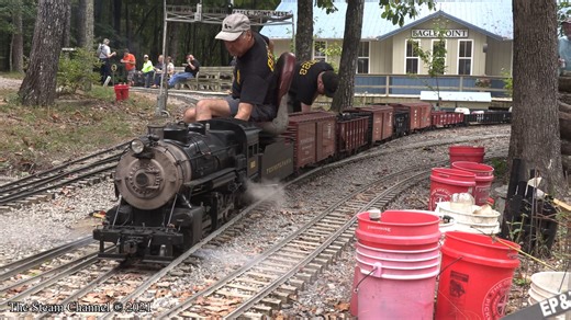 An H10 live steam locomotive rolls out of the service area for a day of operations at the Eagle Point Railroad as other steam moves about the yard. | The Steam Channel