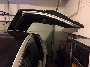 How to manually close Falcon Wing doors (stuck in Garage)