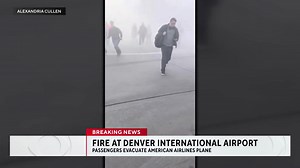 An American Airlines plane carrying 178 people caught fire on the tarmac of Denver International Airport after making an emergency landing this evening. There are no reports of any serious injuries. | CBS Colorado