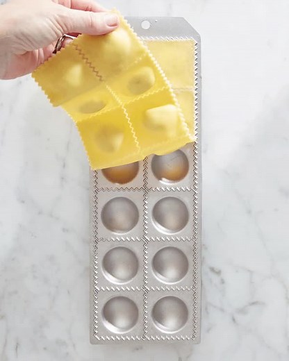 New Year's resolution: try pasta from scratch. 🍝 Our ravioli mold makes it fun and easy to prepare dinner for the family. Ravioli Mold with Roller: https://bit.ly/3FoQazy Food-Processor Pasta Dough: https://bit.ly/3noiKL2 | Williams Sonoma