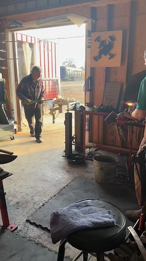 Brian and Andrew forge welding the cranes to the base | Josh Perkins