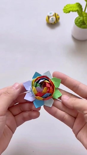 1.2M views · 9.6K reactions | Bright Origami Flower Craft #OrigamiFlower #ColorfulCraft #PaperFlower #EasyOrigami #DIYDecor #CreativeCrafts #HandmadeArt #KidsCraft #PaperFolding #FlowerArt | paper craft ideas | Facebook