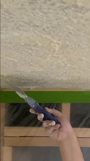 Texturing the ceiling with drywall mud. Basement renovation project.