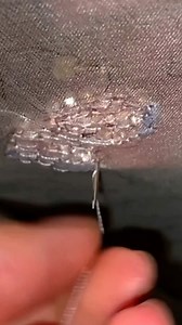 139 reactions | if you were wondering how the beads on my tambour projects stay in place, here’s a look at the underside of my frame! i am new to tambour but have learned that it’s similar to crochet - the main difference being crocheting through fabric and adding beads. See my feed/story for some more images of what the top of this project looks like!! #tambour #tambourembroidery #tambourbeading #coutureembroidery #learntambour #learntambourbeading | Emma Rubinson | Facebook