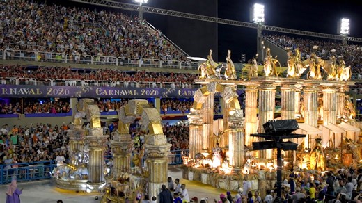 Visiting a large carnival with a full crowd of spectators