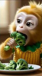 “Baby Monkey Loves Broccoli! 🥦💛 Too Cute!”