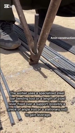 manually bending a piece of steel reinforcing bar