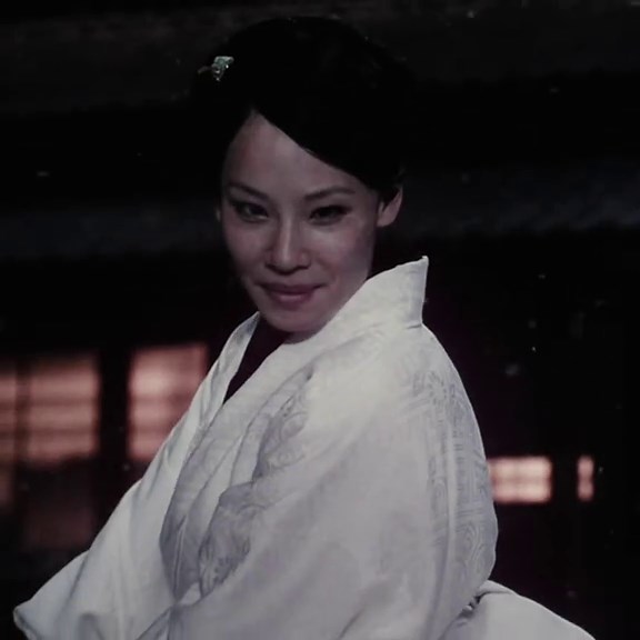 Silly Caucasian Girl Playing with Samurai Swords