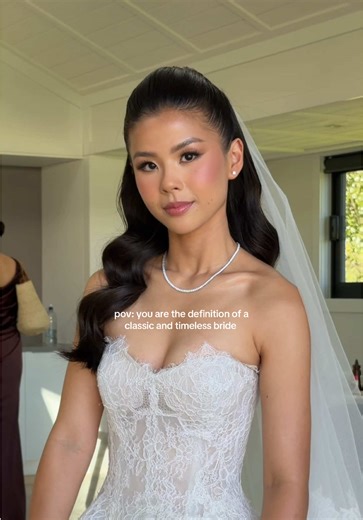 A timeless and classic look doesn’t mean less, it is a process of carefully considered details - the hair, makeup, lash choice, the lip colour, earrings, fabrication of the dress and so much more. Bride is the incredibly divine @kxren.dju 🤍🤍🤍 Hair @RHODIA Wedding Dress @lilysasongkodesigner (IG) Wedding Venue @ripponhall (IG) #destinationwedding #wanakawedding