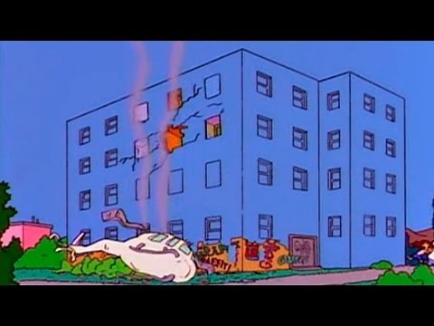 The Simpsons - Helicopter crashing against blue sky building