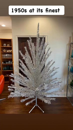 1958 Modern Coatings Aluminum Christmas Tree$2200.00 Modern Coatings, Inc.Aluminum Christmas trees were first commercially manufactured sometime around 1955, remained popular into the 1960s, and were manufactured into the 1970s. The trees were first manufactured by Modern Coatings, Inc. of Chicago.Here we offer a Rare 7.5 Foot Mid-Century Modern Coatings aluminum Christmas tree with original box and sleeves. Modern Coating Company (MCC) invented the aluminum Christmas tree in 1957. In 1958, this