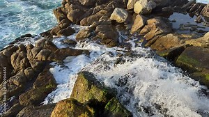Tidal Force: The Ocean's Rush Against the Rocky Shores