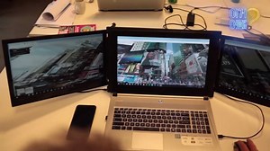 Don't you feel that one monitor isn't enough to multitasking? If you do so, this is what you might need. The laptop with 3 HD monitors! | ShareHows