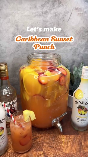 Caribbean Sunset Punch 🏝️🍹 Ingredients - 750ml Malibu - 750ml Pineapple Rum - 750ml Spiced Rum - 1.5L Orange Juice - 1.25L Sprite - 5-6 Cans Pineapple Mango Juice - Pineapple Chunks - Strawberry Slices - Orange Slices - Grenadine #cocktailrecipes #cocktails #cocktail #drinkrecipes #drinks #mixology #cocktailtime #drink #drinktok #cocktails30sec #party #punch