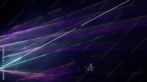Futuristic laser beams dynamically crossing in a vibrant, abstract display of light and color. Lasershow with Multiple Laser Beams in High Quality 4K Video