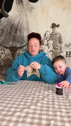 Crafting this beautiful custom cowhide bouquet wrap for a rustic wedding 🤎🐄✨ And yes… I had my favorite little helper along for the ride 🥹🫶🏻 This is what goes into every custom order — real moments, real love, and one-of-a-kind pieces made for your biggest day 🤍 From our hands to your wedding photos, this bouquet wrap is made to be remembered forever 🤠✨ If you’re planning a rustic or western wedding, this is your sign 🤎 💬 Comment 🤠 if you love handmade wedding details 📩 Message us to 