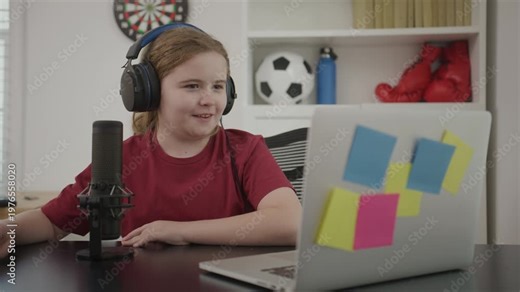 Kid talking to audience blogger mode. Child planning episode vlogger work. Kid filming review blogger style. Child posting vlog blogger channel. Kid recording lesson blogger content.