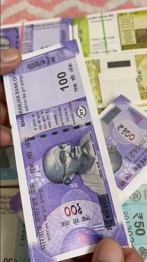 Counting 100-rupees cash 💴