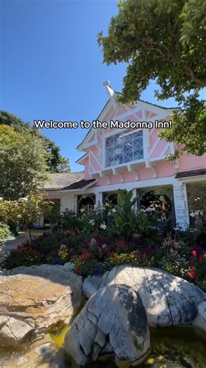 Stay at the world-famous Madonna Inn in SLO CAL to experience its hot pink aesthetic and fantastical rooms. 🏩 Don’t miss dinner at Alex Madonna's Gold Rush Steak House where glitzy, whimsical decor is the star of the show. ✨ Save room for a slice of pink champagne cake! 🍰 📷 @periodicadventures | Visit California