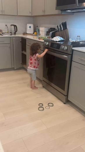 Excuse the messy kitchen. I had just came downstairs from getting Katie bathed and wanted to catch this before she stopped! This girl is on fire! I mean she’s still recovering from pneumonia and she’s started cruising the kitchen counters!! Her legs have gotten so strong and she’s flat footed!! Go girl!! | Kristen Wood