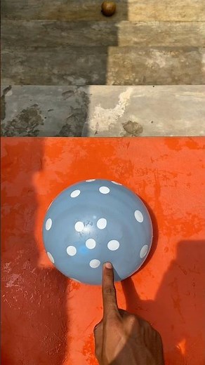 Experiment: Dropping a polka dot water balloon from the top of the stairs, does the balloon explode?
