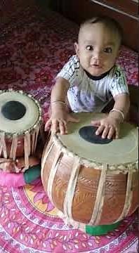 8 months old baby playing Tabla