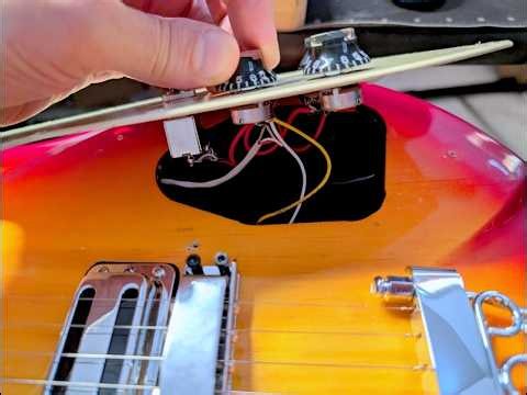 Under the pickguard of the IYV IRK-300 Rick copy guitar - IYV-IRK-300 Semi Hollow Electric Guitar 3T