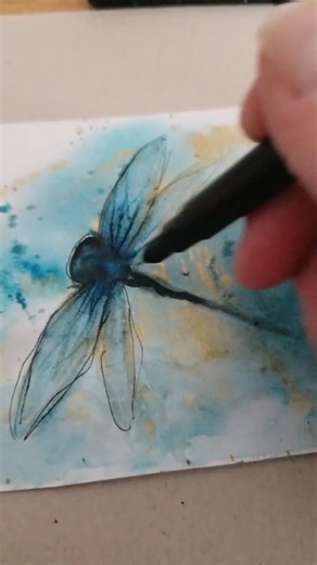 Details on a watercolor dragonfly
