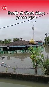 Keadaan terkini banjir kilat yang 'mengepung' kawasan perumahan di Taman Bukit Kemuning, Shah Alam, Selangor, hari ini. | Kosmo Online