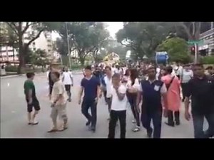 Gang members shout party numbers 369 at funeral in Singapore