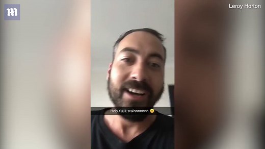 Terrifying moment man plays chicken with giant huntsman spider