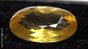 Extreme close-up shows the chatoyancy (cat's-eye effect) in a chrysoberyl.