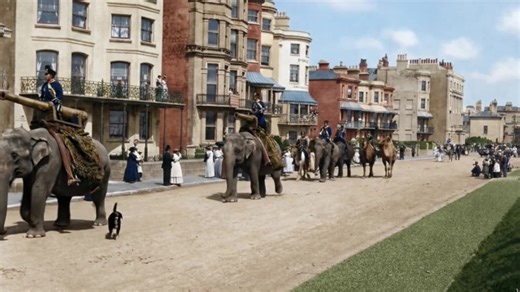 The Time Travel Tour of Edwardian Worthing. Over 110 years ago! Life around the English seaside town in the early 1900's..... and the circus comes to town! *The circus walks west along Marine Parade. *Edwardians promenading along Marine Parade with the birdcage bandstand on the right. *A Brass Band plays in South Street in front of the old town hall. *Looking west along Marine Parade. *Soldiers parade north along Chapel Road *The Childrens' Day parade in South Street as part of the Peace Celebra