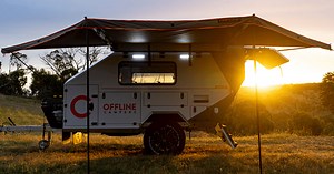 Brawny Domino dual-mode trailer swallows campers with yawning jaws