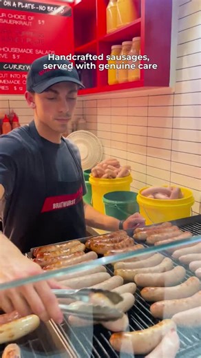 Brats this good don’t just show up, they arrive! Hot off the grill, crisped just right, and packed with enough punch to stop you mid sentence. 📍Stall 97–100, Queen Vic Market. Swing by and taste the difference that pride makes! | Bratwurst Shop & Co