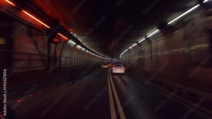 driving POV emerging from Holland Tunnel in NJ