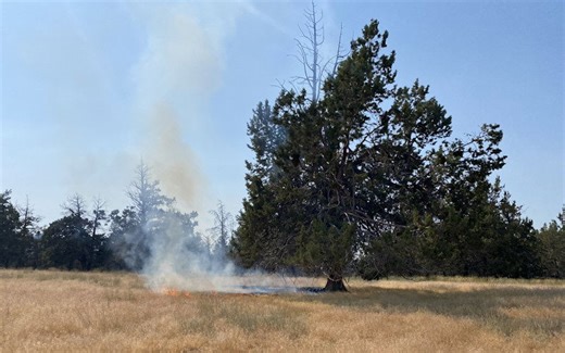 Bend firefighters stop two smoldering fires at small sizes in field on Skyline Ranch Road, lot near Caldera High School