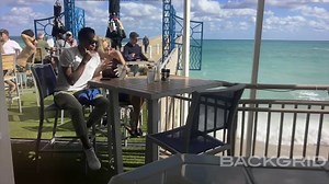 T.J. Holmes and Amy Robach make out like teenagers on Miami vacation