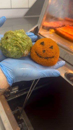 🎃👻 HALLOWEEN IDEA ALERT! 👻🎃 We’re thinking of doing some spooky rissoles for Halloween tomorrow… what do you think? 😈 🟢 The Swamp Monster – a green battered rissole, crispy and creepy! 🟠 The Pumpkin Smiler – a cheeky orange rissole with a happy pumpkin grin! 🎃 Shall we do them? 👀 Drop a 🟢 or 🟠 in the comments and tell us which one you’d try first! #HalloweenEats #SpookyRissoles #TrickOrTreat #FoodFun #HalloweenSpecial | Crispy Johns Fish & Chips