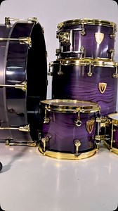 2.5K reactions · 77 comments | Ready for takeoff ✈️ This purple drum kit is all set to fly to its new home in the USA  With its gold hardware, the contrast makes its beauty stand out even more — a truly one-of-a-kind piece for a one-of-a-kind drummer!  What rating would you give it from 1 to 10? Let us know in the comments!  #drumkit #customdrums | Varus Drums | Facebook