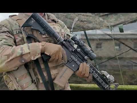 US Army Sergeant First Class (E-7) Demonstrates a Function Check on a M4 Carbine Assault Rifle