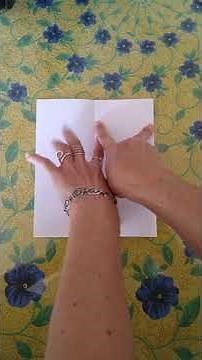 Cómo doblar un folleto en tres