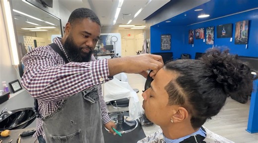 Local barber shop provides half-priced haircuts for furloughed workers