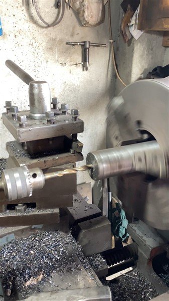 Drill a hole using lathe machine #restoration #hydraulic #technology #lathework #diy #fbreels | MacTech Pakistan